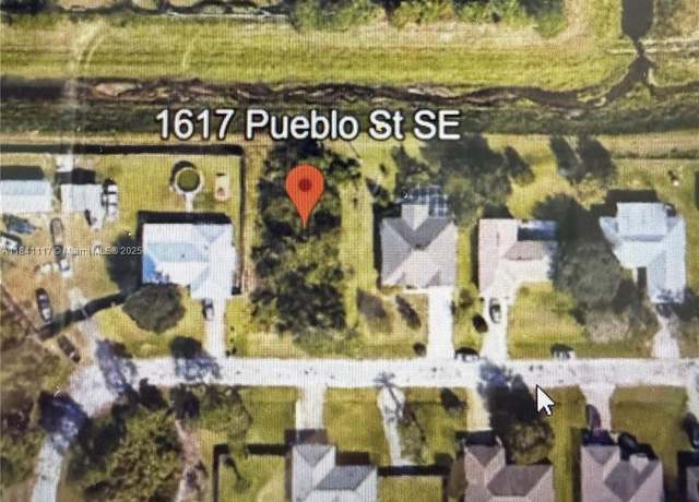 Property at 1617 SE Pueblo St, Palm Bay, FL 32909