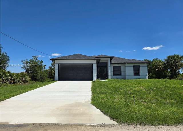 Property at 1011 Harwood Ave S, Lehigh Acres, FL 33974, 3 beds, 2.5 baths