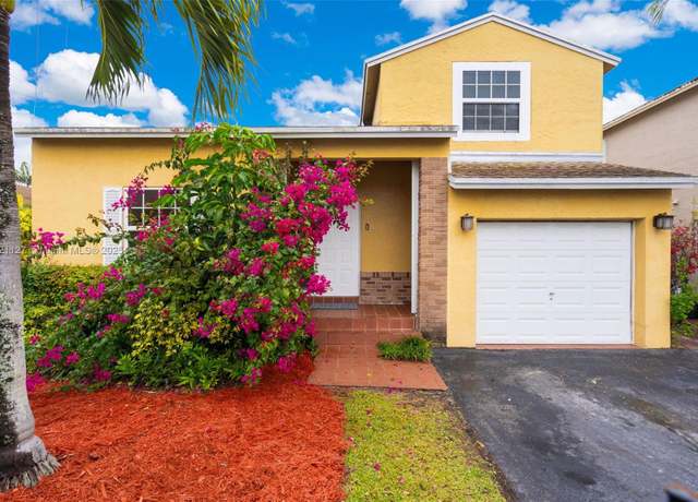 Property at 8255 NW 192nd Ter, Hialeah, FL 33015, 3 beds, 2.5 baths