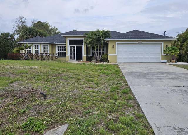 Property at 713 Palmetto, Lehigh Acres, FL 33972, 4 beds, 3 baths