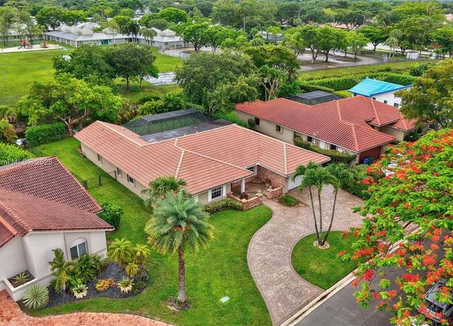 Property at 5655 NW 86th Ave, Coral Springs, FL 33067, 4 beds, 2.5 baths