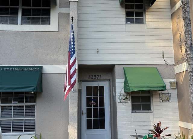 Property at 12371 SW 52nd St, Cooper City, FL 33330, 2 beds, 2.5 baths