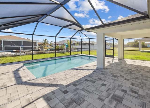 Property at 1909 NE 2nd Ave, Cape Coral, FL 33909, 4 beds, 3 baths