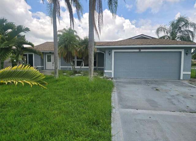 Property at 1744 SE Berkshire Blvd, Port St Lucie, FL 34952, 3 beds, 2 baths