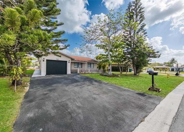 Property at 9103 NW 81st Ct, Tamarac, FL 33321, 3 beds, 2 baths