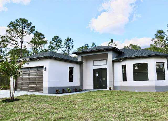 Property at 733 Sunrise Blvd, Lehigh Acres, FL 33974, 4 beds, 2 baths