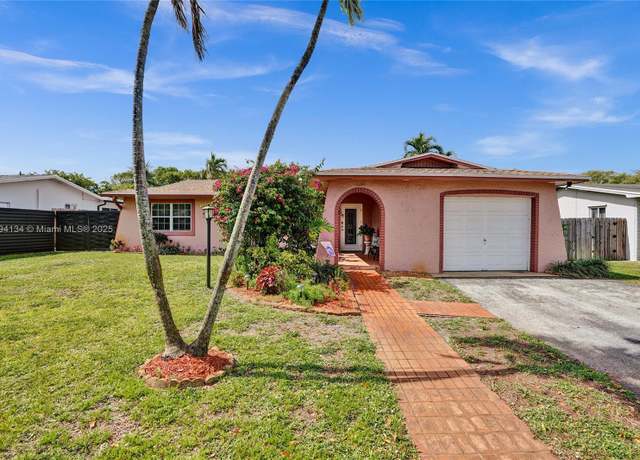 Property at 11240 Sheridan St, Pembroke Pines, FL 33026, 4 beds, 2 baths