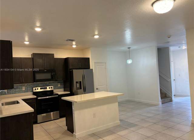 Property at 1090 SE 23rd Ave, Homestead, FL 33035, 4 beds, 3 baths