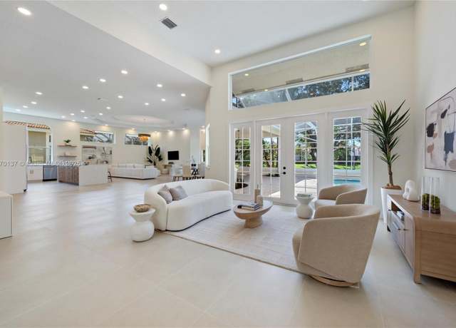 Property at 12140 NW 10th St, Coral Springs, FL 33071, 5 beds, 5 baths