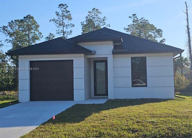 Property at 229 Bowman Ave S, Lehigh Acres, FL 33974, 3 beds, 2 baths
