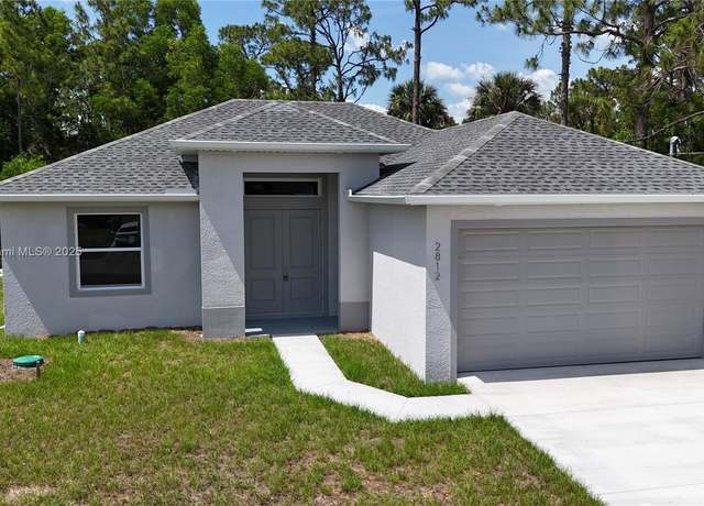 Property at 2812 10th St W, Lehigh Acres, FL 33971, 3 beds, 3 baths