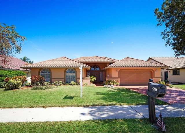 Property at 9677 N Springs Way, Coral Springs, FL 33076, 4 beds, 2 baths