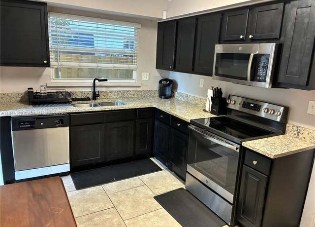 Property at 500 Evergreen Dr, Lake Park, FL 33403, 4 beds, 2 baths