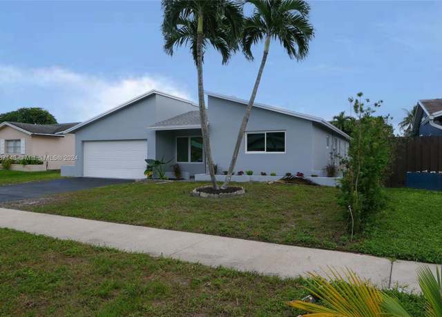 Property at 5810 NW 56th Pl, Tamarac, FL 33319, 3 beds, 2 baths