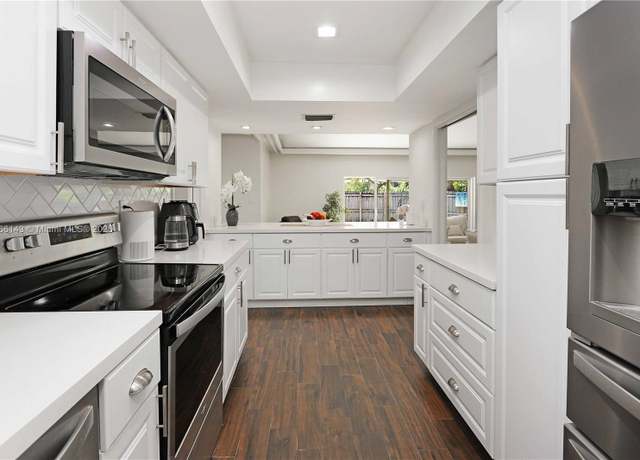 Property at 19915 NE 10th Place Way, Miami, FL 33179, 2 beds, 3 baths