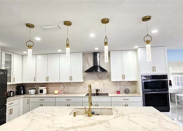 Property at 9770 SW 13th Ter, Miami, FL 33174, 3 beds, 2 baths