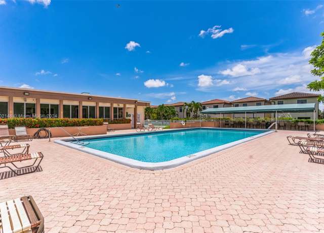 Property at 4990 E Sabal Palm Blvd #109, Tamarac, FL 33319, 1 bed, 1.5 baths