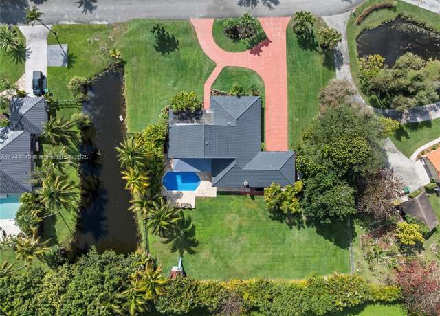 Property at 11965 SW 15th Ct, Davie, FL 33325, 4 beds, 3 baths