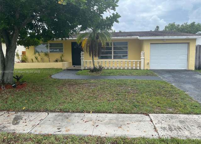 Property at 9540 NW 25th St, Sunrise, FL 33322, 3 beds, 2 baths