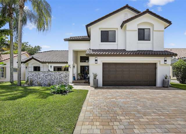 Property at 1154 Laguna Springs Dr, Weston, FL 33326, 4 beds, 3 baths