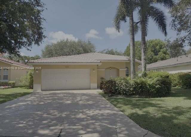 Property at 4390 NW 41st Pl, Coconut Creek, FL 33073, 3 beds, 2 baths