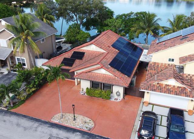 Property at 18840 NW 77th Ct, Hialeah, FL 33015, 4 beds, 2 baths