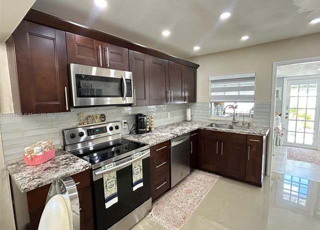 Property at 1941 NW 113th Ter, Miami, FL 33167, 3 beds, 2 baths