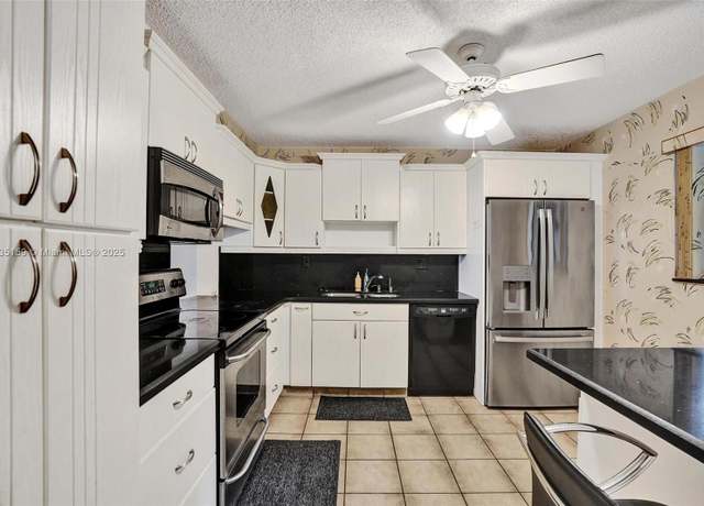 Property at 4965 E Sabal Palm Blvd #207, Tamarac, FL 33319, 2 beds, 2 baths