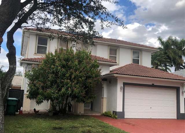Property at 8767 NW 139th Ter, Miami Lakes, FL 33018, 4 beds, 3 baths