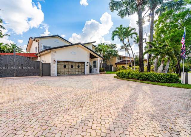 Property at 10298 NW 130th St, Hialeah Gardens, FL 33018, 4 beds, 4 baths