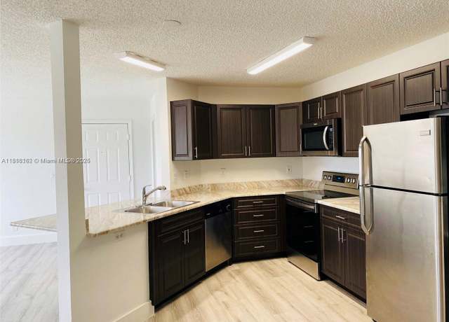 Property at 4015 W Mcnab Rd Unit D203, Pompano Beach, FL 33069, 3 beds, 2 baths