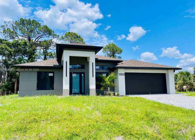 Property at 1211 Gerald Ave, Lehigh Acres, FL 33972, 4 beds, 2 baths