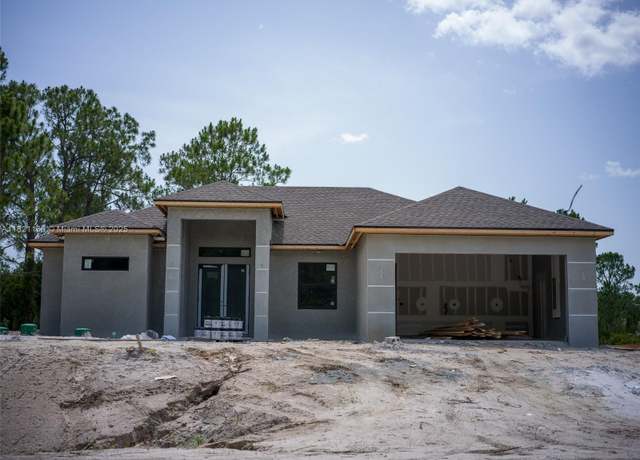 Property at 811 Rush Ave, Lehigh Acres, FL 33972, 3 beds, 2 baths