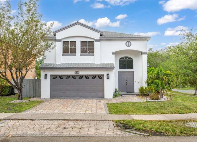 Property at 1463 NW 48th Ave, Coconut Creek, FL 33063, 4 beds, 2.5 baths