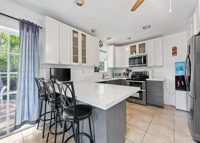 Property at 9350 SW 165th St, Palmetto Bay, FL 33157, 4 beds, 2 baths