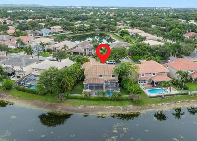 Property at 5920 NW 54th Cir, Coral Springs, FL 33067, 4 beds, 3.5 baths