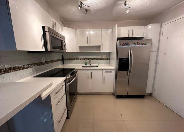 Property at 1470 NE 125th Ter #308, North Miami, FL 33161, 1 bed, 1.5 baths