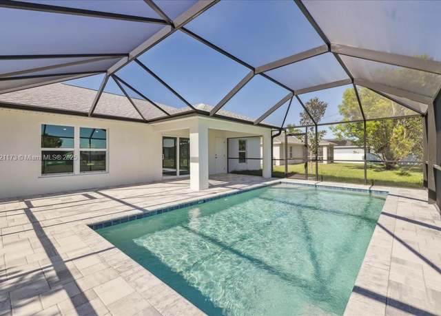 Property at 1119 NW 1st Pl, Cape Coral, FL 33993, 4 beds, 3 baths
