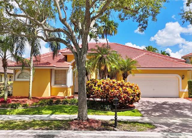 Property at 2694 Oakbrook Dr, Weston, FL 33332, 5 beds, 3.5 baths