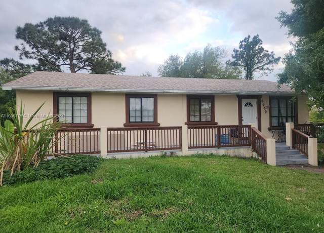 Property at 3211 SW 17 St SW, Lehigh Acres, FL 33976, 4 beds, 2 baths