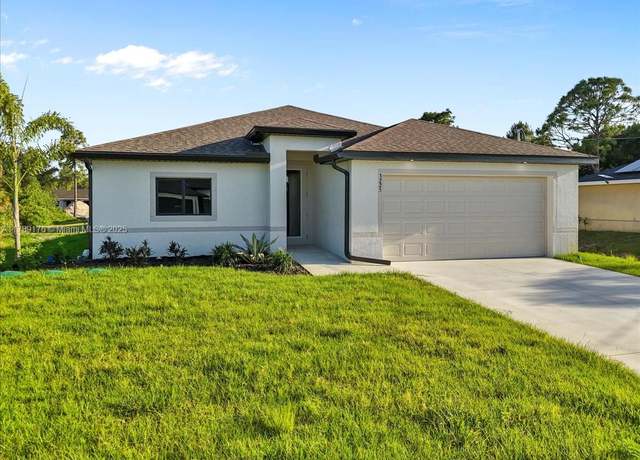Property at 3225 W 58 St, Lehigh Acres, FL 33971, 4 beds, 2 baths