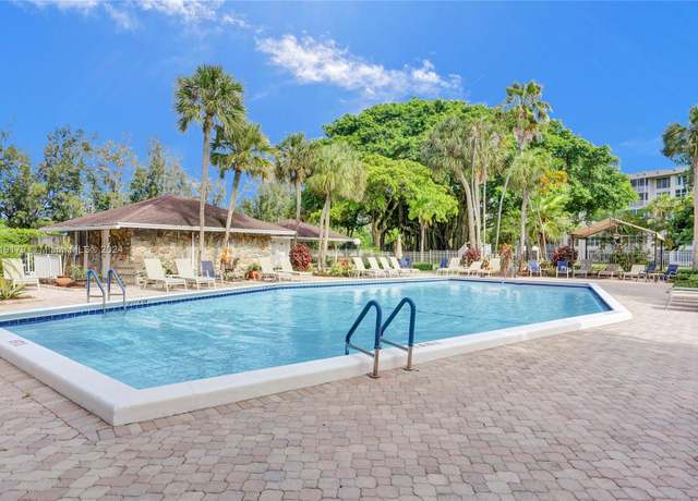 Property at 3000 S Course Dr #107, Pompano Beach, FL 33069, 1 bed, 1.5 baths