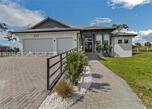 Property at 653 SW 23rd St, Naples, FL 34117, 4 beds, 3.5 baths
