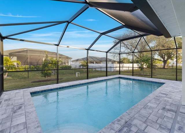 Property at 1203 NW 4th Pl, Cape Coral, FL 33993, 4 beds, 3 baths