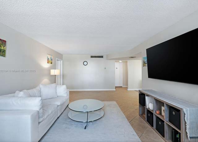 Property at 100 Golden Isles Dr #101, Hallandale Beach, FL 33009, 1 bed, 1.5 baths