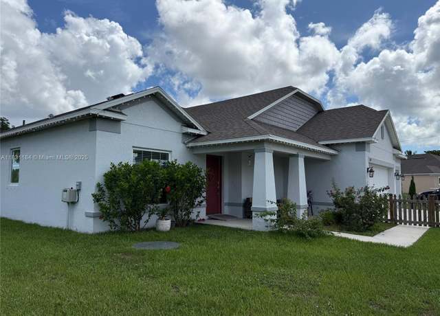Property at 1002 SW College Park Rd, Port St Lucie, FL 34953, 4 beds, 3 baths
