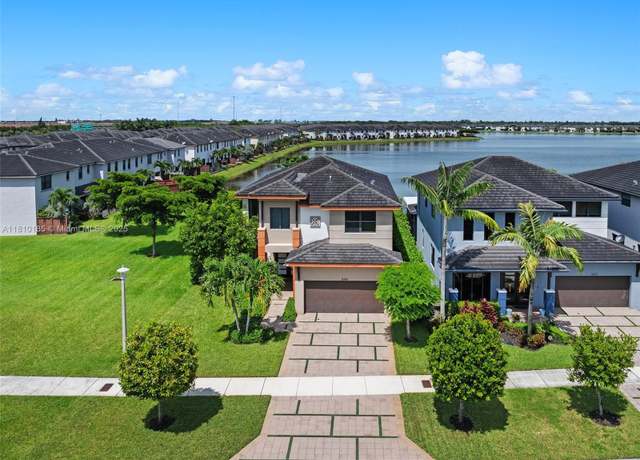 Property at 9145 NW 154th Ter, Miami Lakes, FL 33018, 4 beds, 3 baths
