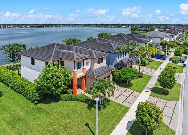 Property at 9145 NW 154th Ter, Miami Lakes, FL 33018, 4 beds, 3 baths