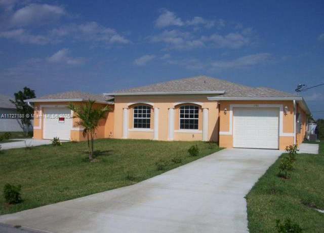 Property at 149/151 SW Pennfield, Lehigh Acres, FL 33974, 6 beds, 4 baths