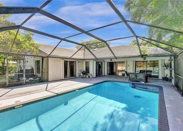 Property at 5101 NW 47th Ave, Coconut Creek, FL 33073, 4 beds, 2 baths